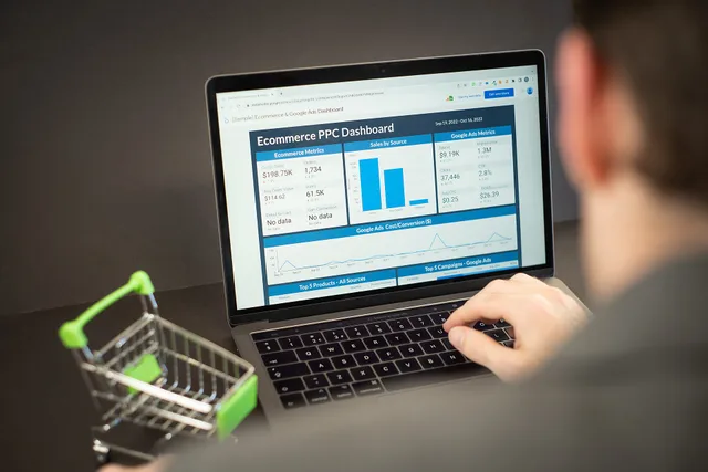 A photo of an employee checking PPC performance on an ecommerce dashboard on a laptop. This image has been made available for use under the Creative Commons Licensing agreement. If you use it, please link back to our website at www.zuko.io. SEO tools for ecommerce: Shopify vs WooCommerce for UK shops