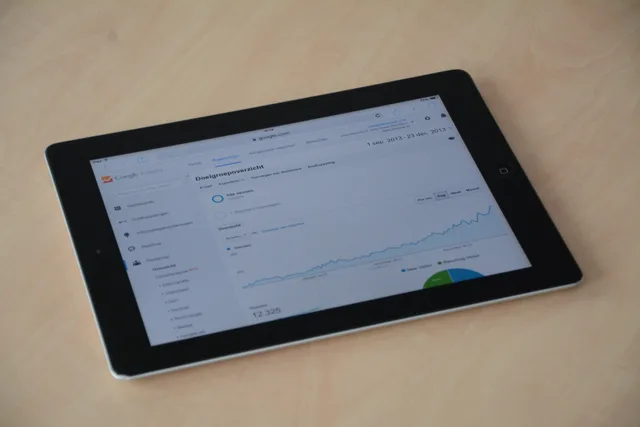 A digital tablet showing a web analytics dashboard with graphs and charts. Why SEO tools market size cannot be a single official number